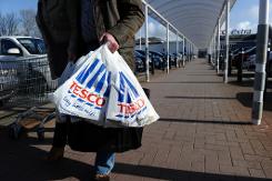 Tesco agrees Chinese deal but profits dive in Europe