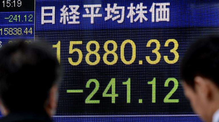 Asian shares mostly down after losses in New York