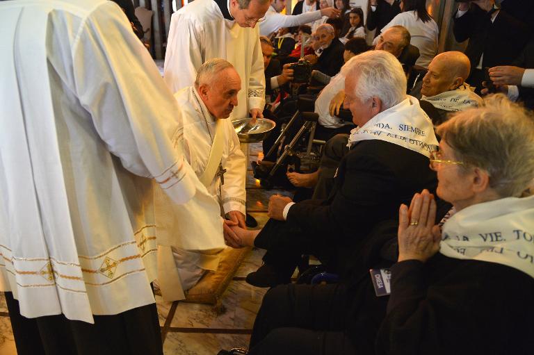 Pope washes feet of disabled, including elderly Muslim