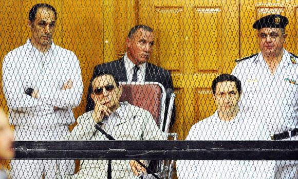 Mubarak's sons freed pending graft retrial Mubarak's sons freed pending graft retrial