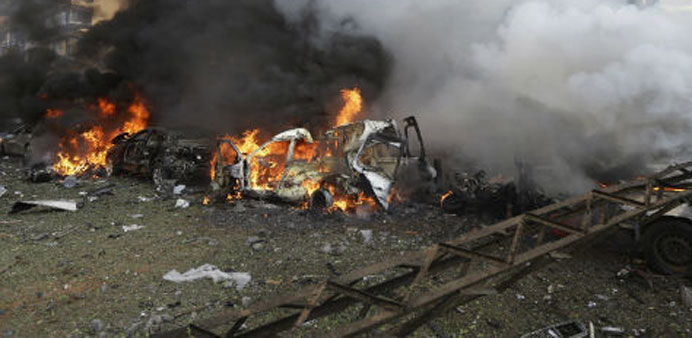 Double bomb blasts kill 20 in Syria's Hasakeh