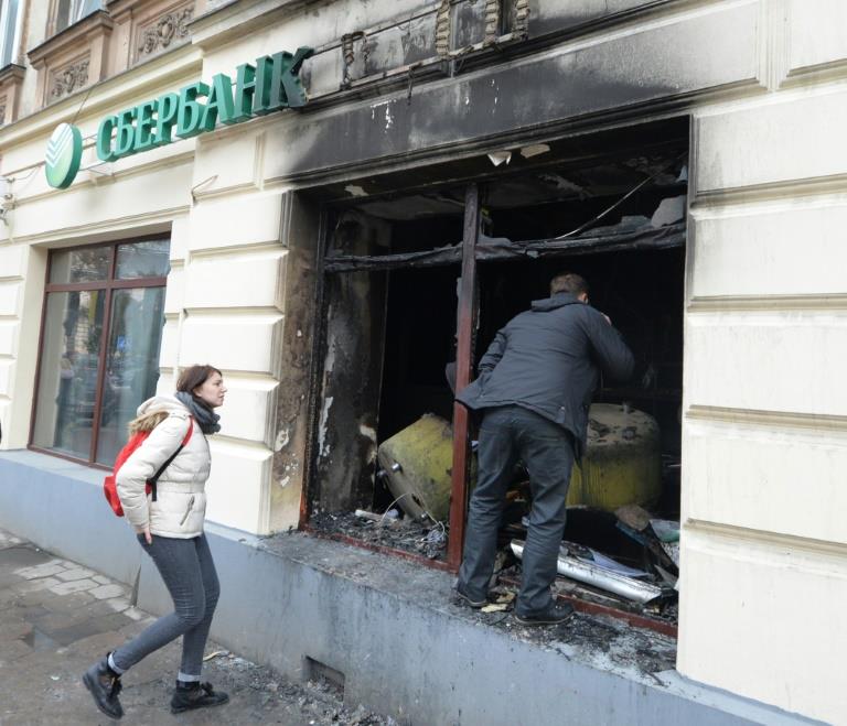 Russian banks come under attack across Ukraine