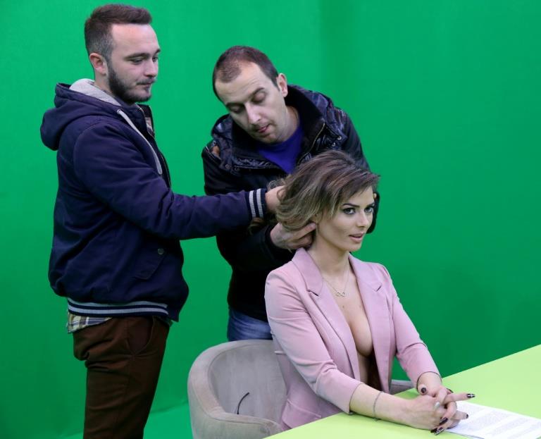 Albanian TV newsreaders strip down to boost audience | MENAFN.COM