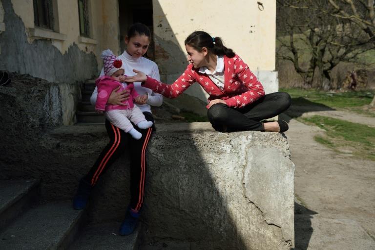 Pregnant at 15, the teenage mothers of Romania
