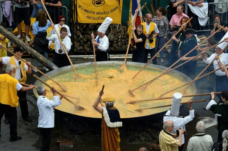 Visitors flock to Belgium's giant omelette festival despite scandal