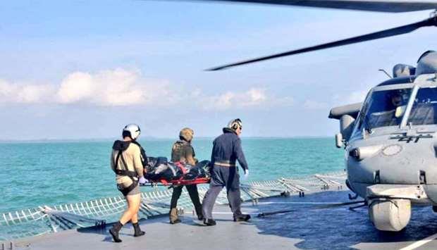 US Navy says remains found by Malaysia not of a USS McCain sailor