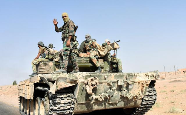Syrian army fights to secure corridor into Deir Ezzor