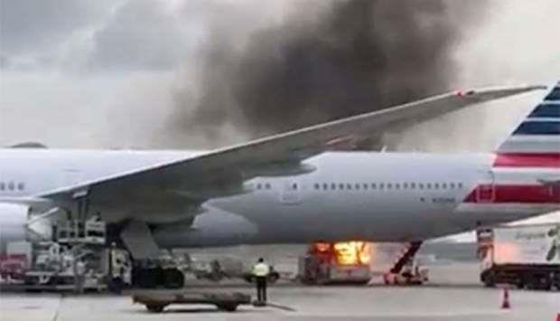 Qatar- Fire breaks out near passenger jet at Hong Kong airport