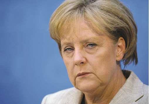 Pressure mounts on Merkel over migrants