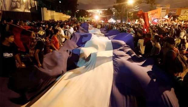Qatar- Honduran election crisis festers as rivals claim victory