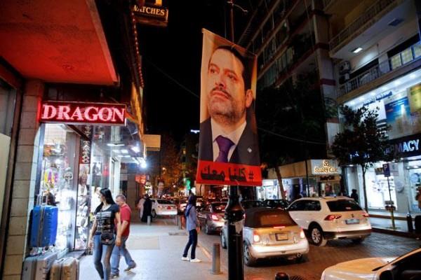 Love him or hate him, Lebanese want PM Hariri home