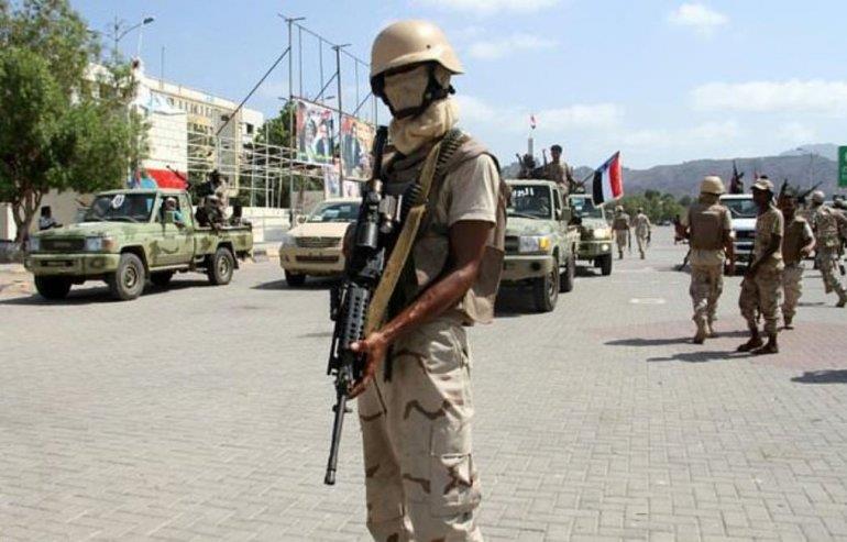 Twin suicide attacks hit Yemen security buildings: official