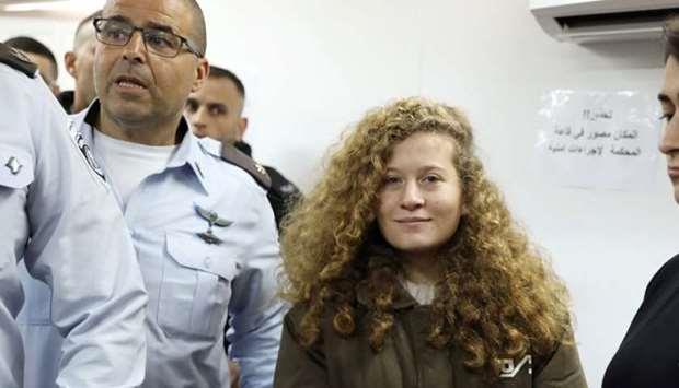 Israel judge orders Palestinian teen in 'slap video' held through trial