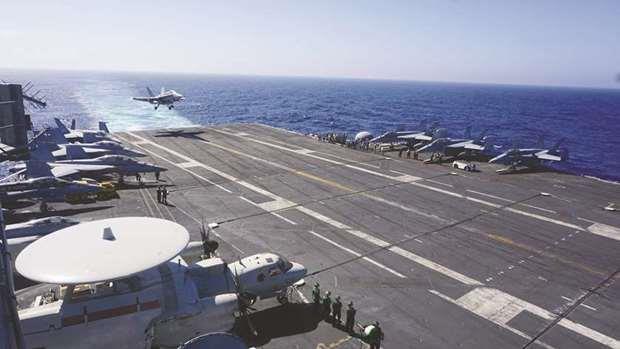 US presence matters, says admiral on aircraft carrier in South China Sea