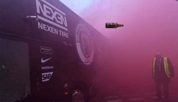 Liverpool face Uefa punishment after fans attack Manchester City bus