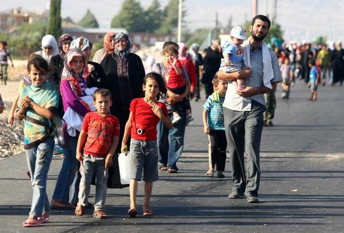 First group of Syrian refugees returns from Lebanon to Damascus