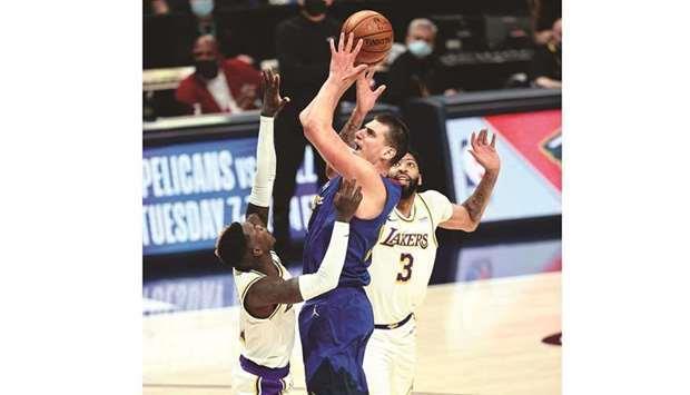 Jokic shines as Nuggets dominate Lakers - Vimarsana News