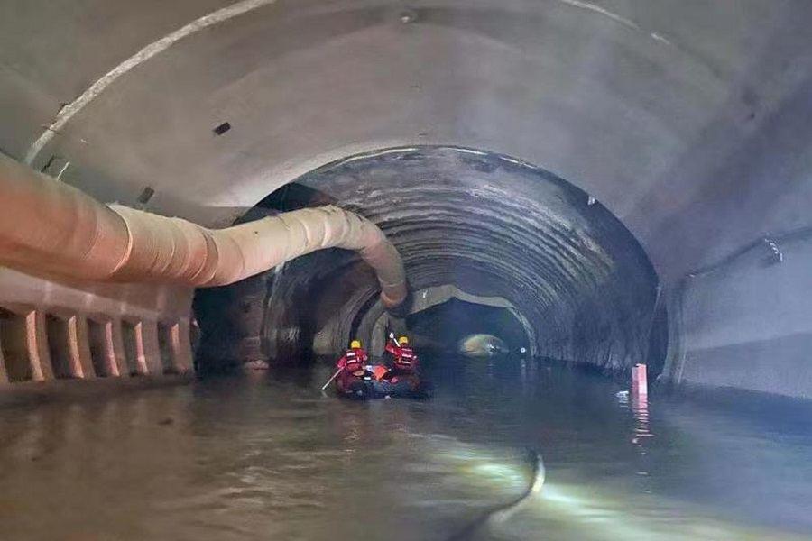 Death toll in China flooded highway tunnel rises to 13