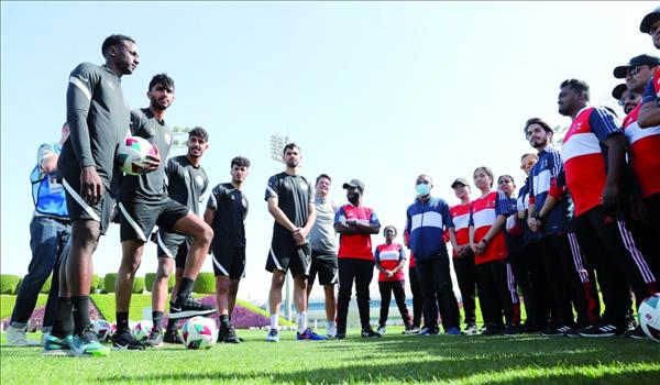 Qatar players conduct coaching session with Arab Cup volunteers