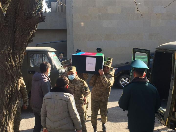 Bodies of Azerbaijani servicemen from military helicopter crash, taken to farewell ceremony (PHOTO)