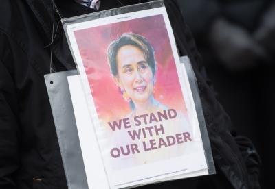  Suu Kyi's jail term halved by 2 yrs 