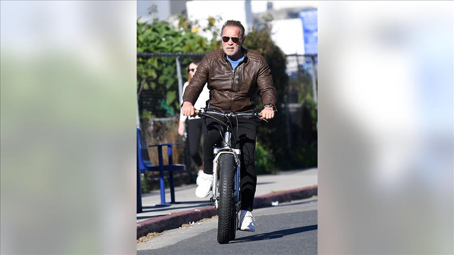 Afghanistan - Arnold Schwarzenegger has seen riding a bike in Los Angles after being involved in a car crash