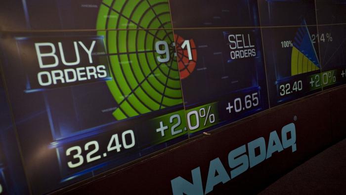 Nasdaq 100 Pares Gains During Volatile Fed Day, Tesla Falls on Earnings