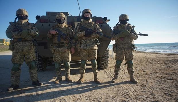 Qatar - 'We don't want wars': Russia sends less hawkish message on Ukraine