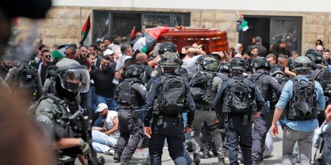 Israeli Forces Attack, Beat Palestinian Mourners In Journalist's Funeral