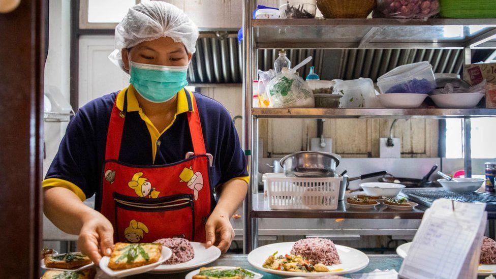 Thai canning. Thai newspaper in Thai.