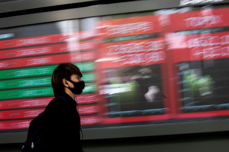 Asian markets' rally fizzles as rates, inflation fears return