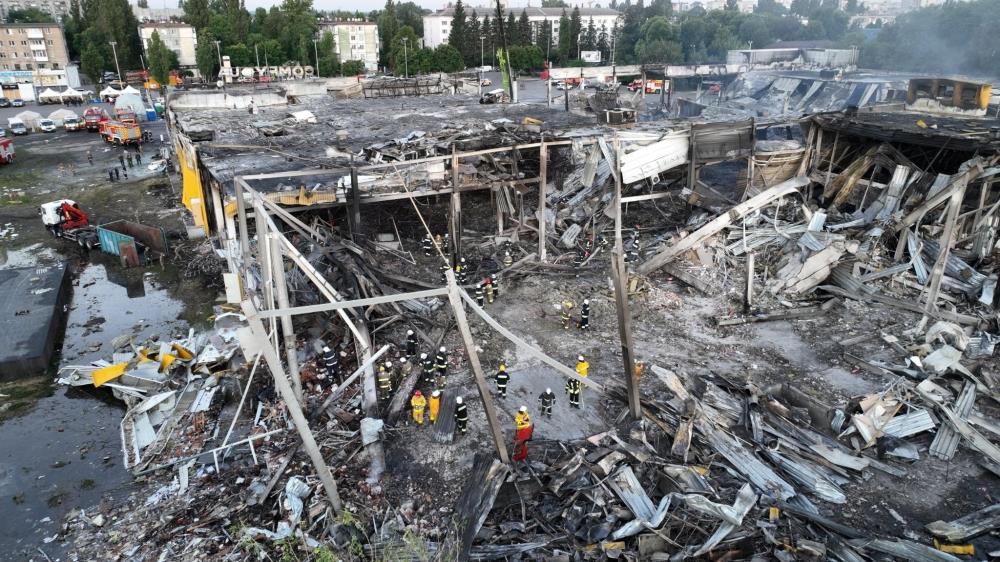 Ukraine Mourns Shopping Mall Attack Victims, War Crimes Team On The Scene