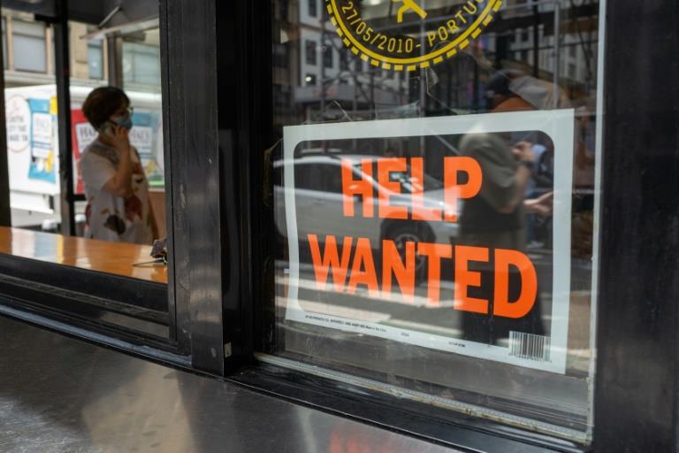 US job growth surges by half a million in July, wages rise