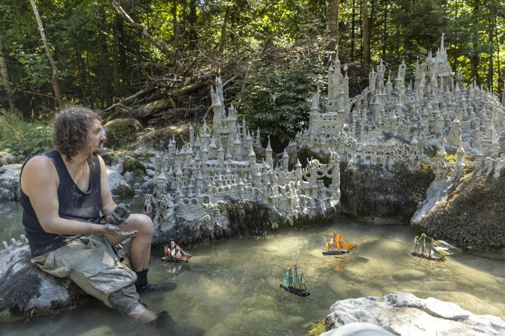 Swiss Artist Sculpts Sprawling Model Castle On Dried River Bank