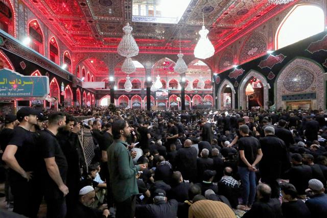 Shiite Muslims Throng Iraqi Shrine City To Mark Ashura