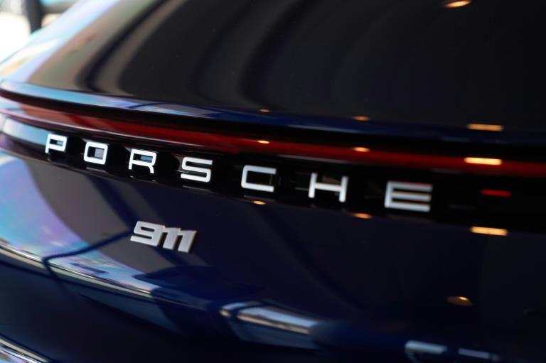 Defying turmoil, Porsche to go 'full throttle' with blockbuster IPO