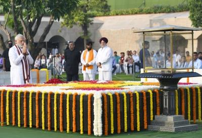  PM Modi Pays Tributes To Mahatma Gandhi, Urges All To Buy Khadi 