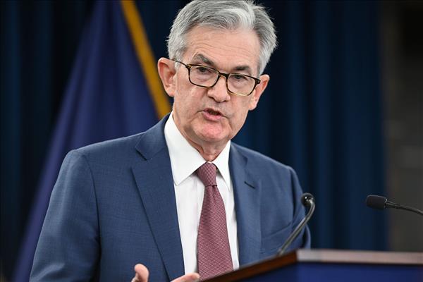 Fed Slows Rate Hikes But Signals More To Come