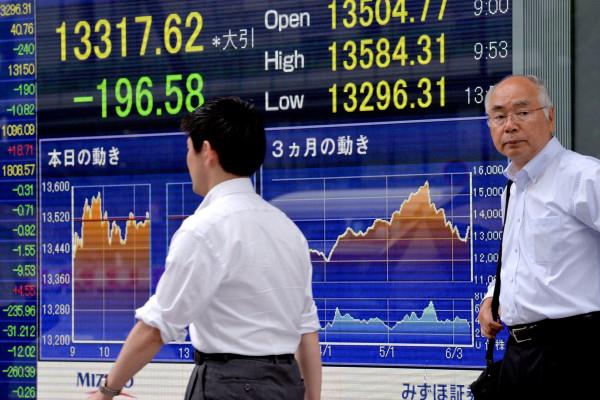 Japan Shares End Higher As Bank Stocks Rise Amid Easing Financial Crisis Fears