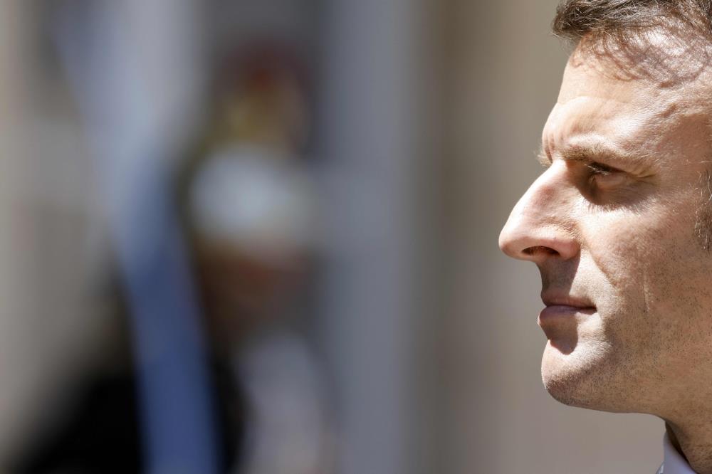 Macron Pays Tribute To Slain AFP Reporter Arman Soldin