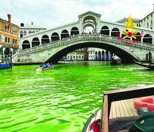 Venice's Waters Turn Fluorescent Green