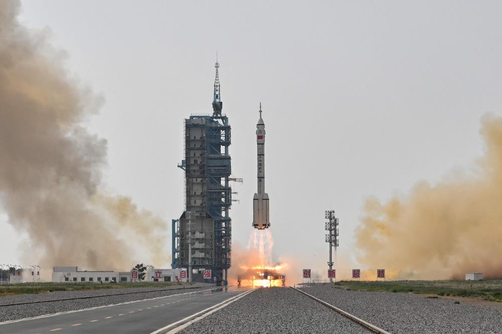 Chinese Mission With First Civilian Reaches Space Station