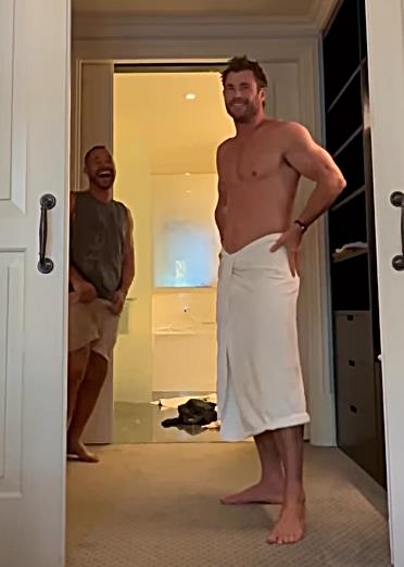 Chris Hemsworth Shows Off Muscles Wearing Nothing But Towel