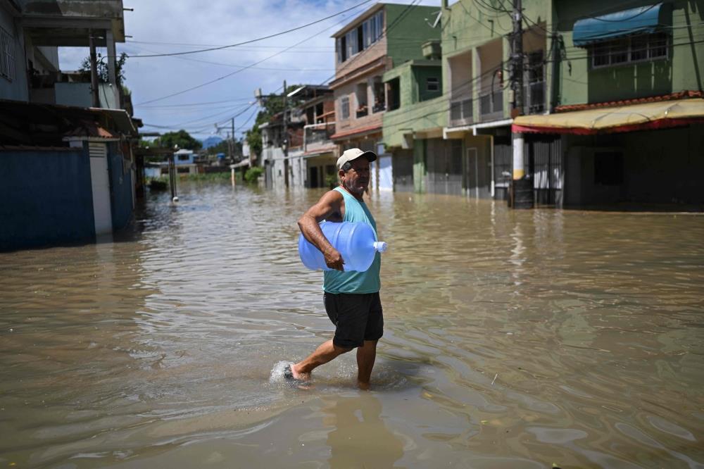 Brazil's Rio De Janeiro Confronts Flood Damage After Heavy Rain Kills ...