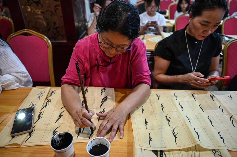 China's Gen Z Women Embrace Centuries-Old Script