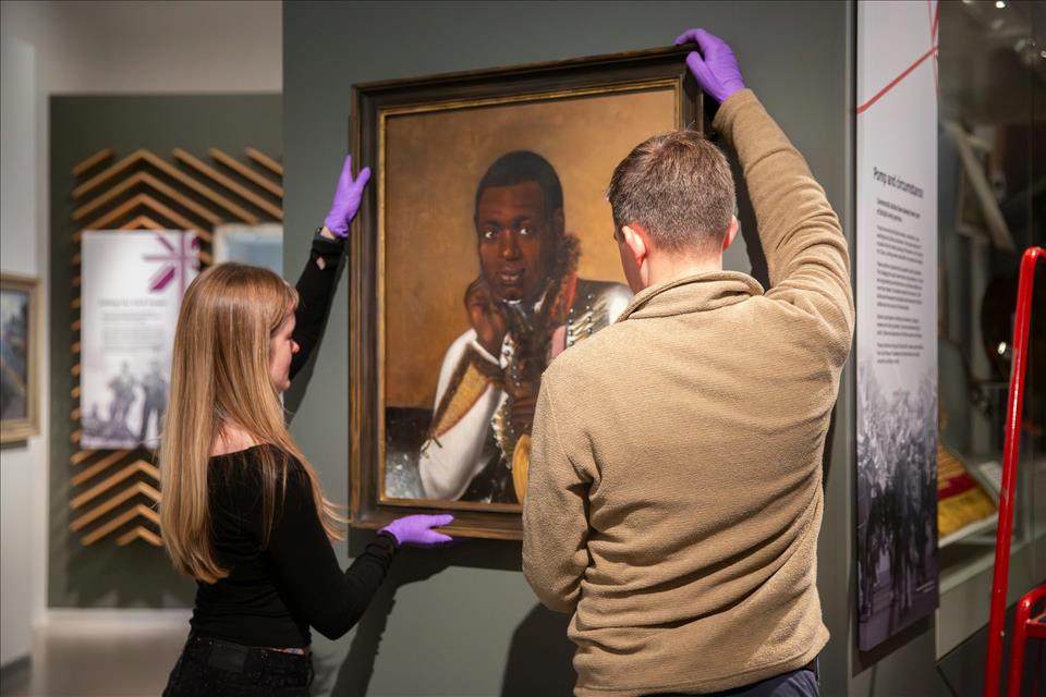 What A Newly Identified Portrait Of A Black Napoleonic Soldier Reveals About British Army Diversity The restored portrait of Private Thomas James being installed at the National Army Museum.        Courtesy of the National Army Museum