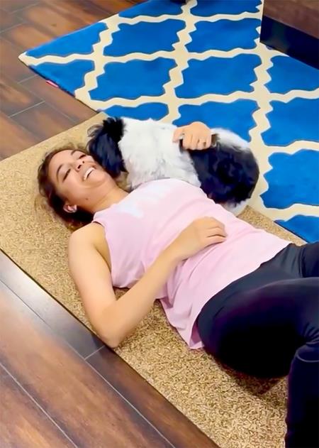 Keerthy Suresh's Workout Session Interrupted By A Cute Intruder Keerthy Suresh's Workout Session Interrupted By A Cute Intruder