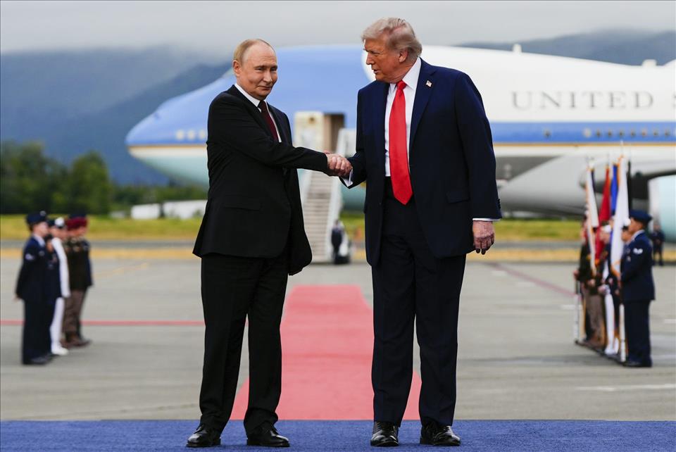 Trump And Putin Didn't Hold New Peace Talks After All - But That Was Likely Putin's Plan All Along U.S. President Donald Trump greets Russian President Vladimir Putin before an ostensible peace meeting in August 2025 in Alaska.          (AP Photo/Julia Demaree Nikhinson)