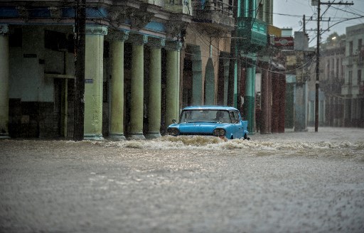 Vietnam issues flood warning as Typhoon Noru is downgraded 