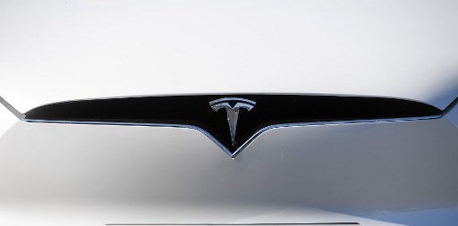 Tesla sees peak profit, income October-December 2022